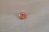 Padparadscha sapphire, true sunset-color, GIA certified 0.79 ct