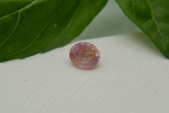 Pastel orangish Pink Sapphire, design cut 1.35 ct