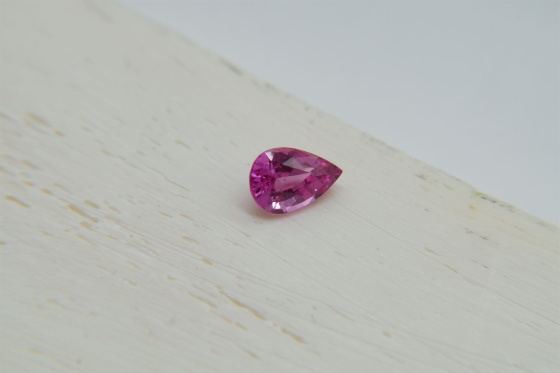 Vivid Orange Pink Sapphire, padparadscha-like 0.77 ct