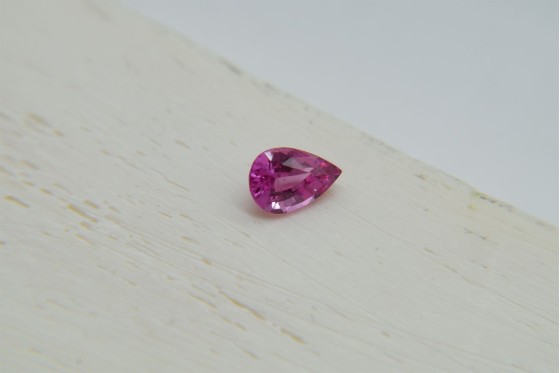 Vivid Orange Pink Sapphire - Oval - 0.77 ct. - IGL